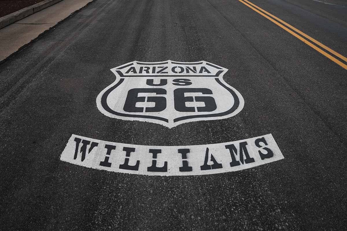 Arizona Route 66 Williams Sign in Road