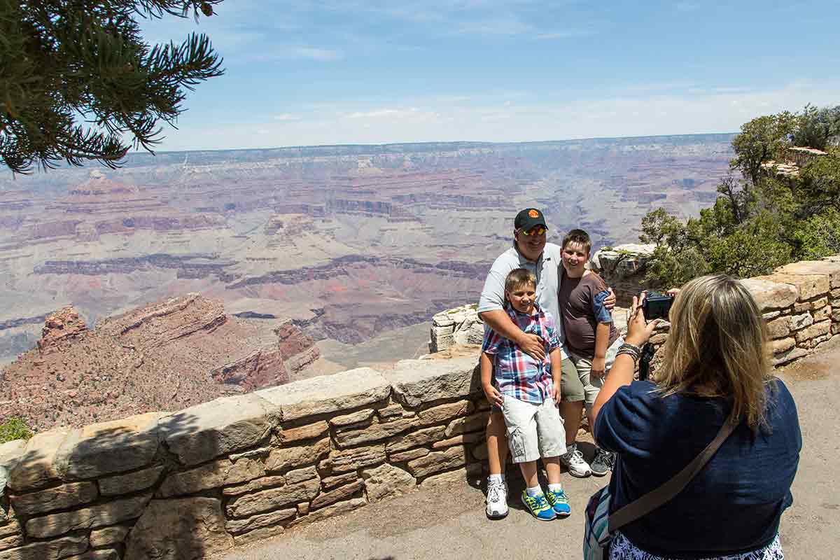 Grand Canyon Mom Taking Picture of Family